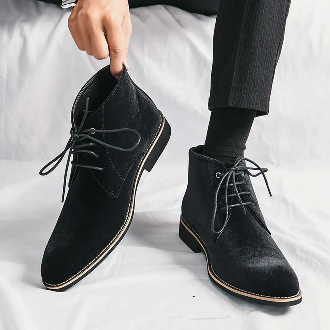 Black suede sewn accents lace up shoe boot