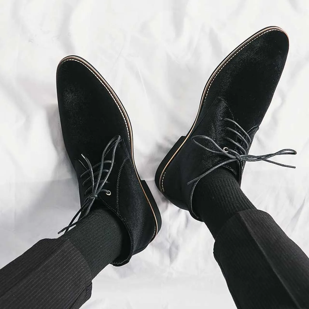 Black suede sewn accents lace up shoe boot