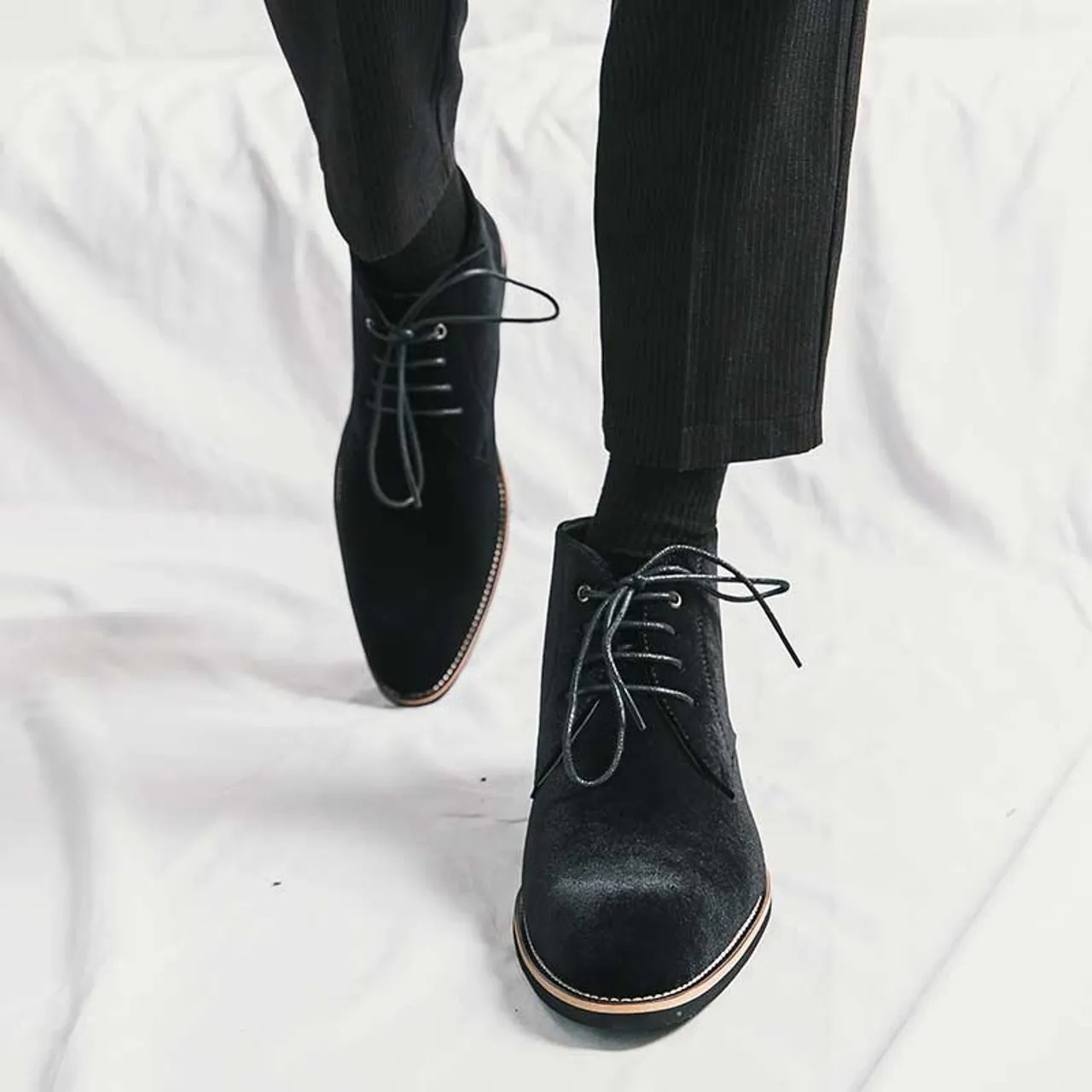 Black suede sewn accents lace up shoe boot