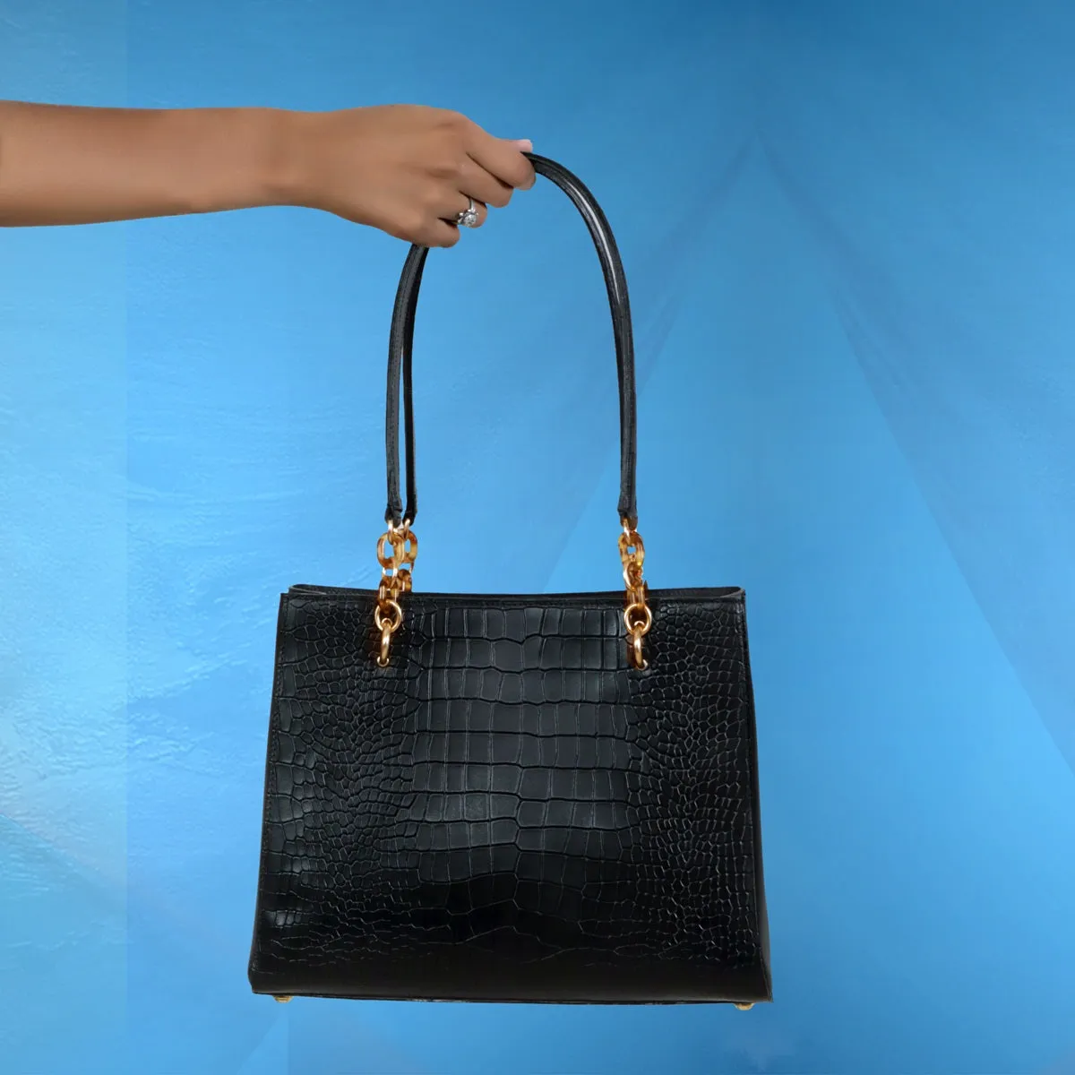 Medium Sized Hand Bag In Croco Deep Cut Textured Black Leather