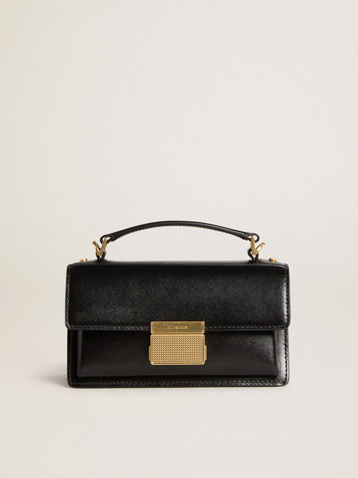 Small Venezia Bag in black boarded leather with gold details