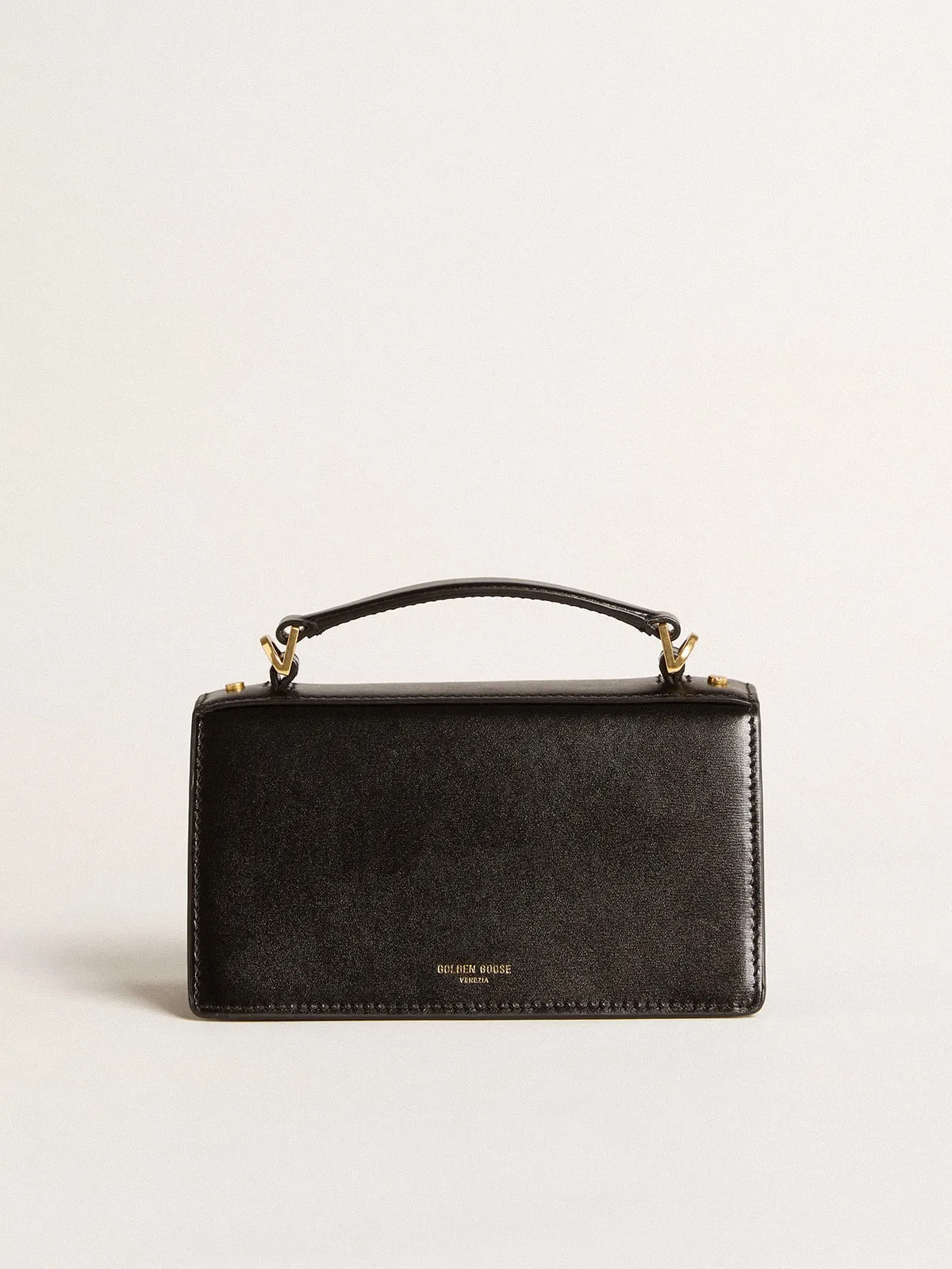 Small Venezia Bag in black boarded leather with gold details