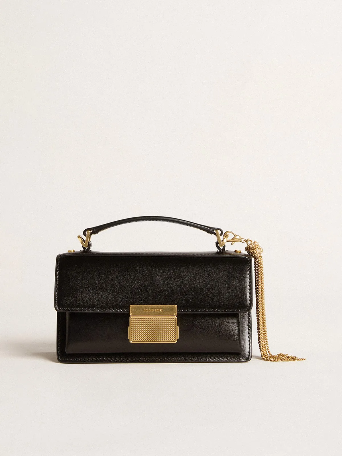 Small Venezia Bag in black boarded leather with gold details