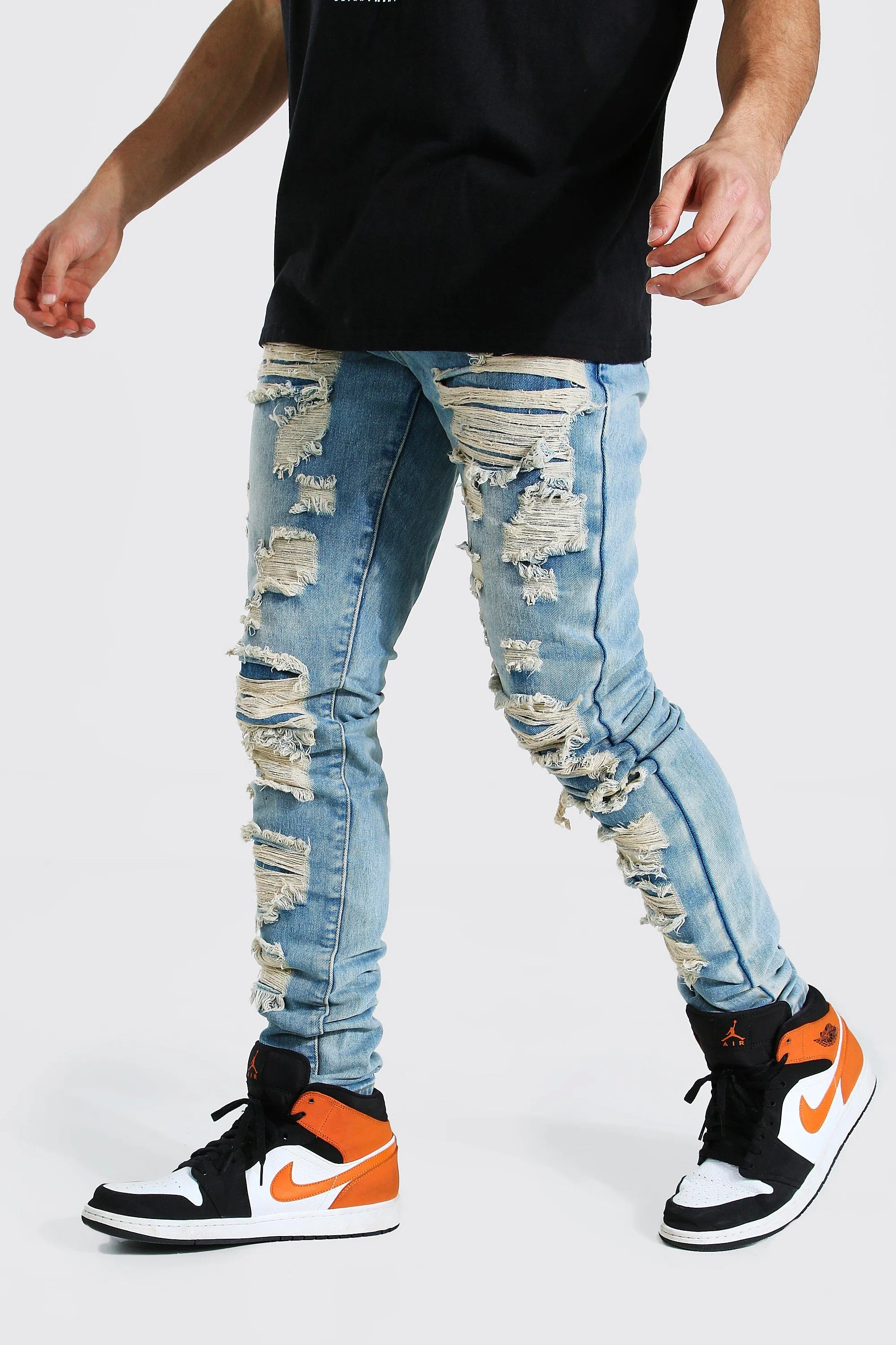 Tapered Stacked Leg Shredded Jeans